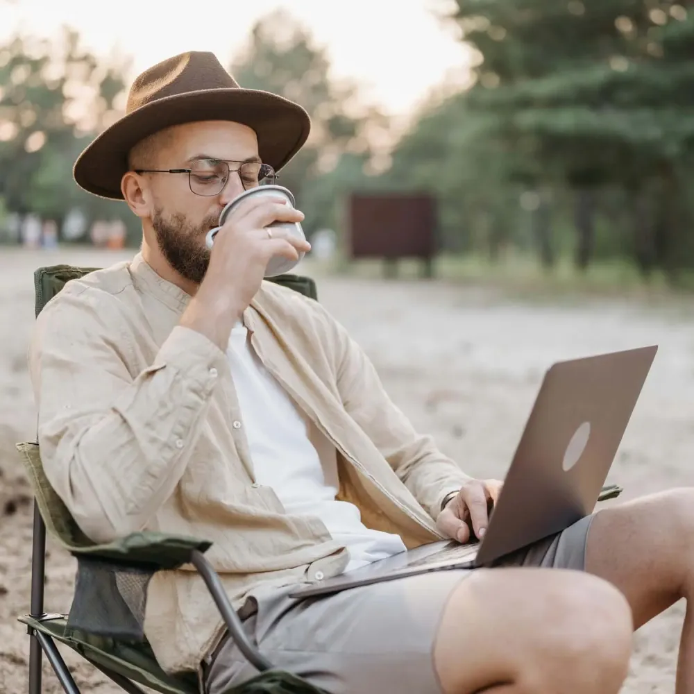 Peter, working from a camp chair